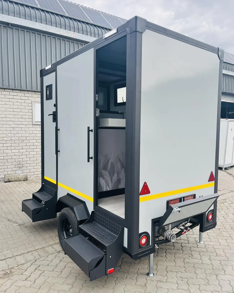 Restroom trailer steps and hitch.